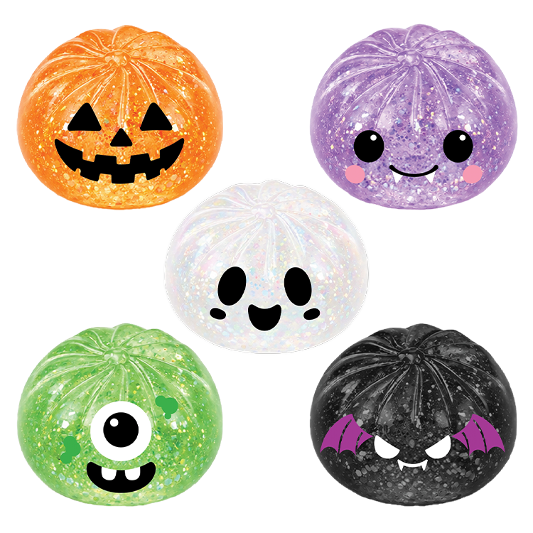 Five colorful glittery balls with Halloween-themed designs on a white background.